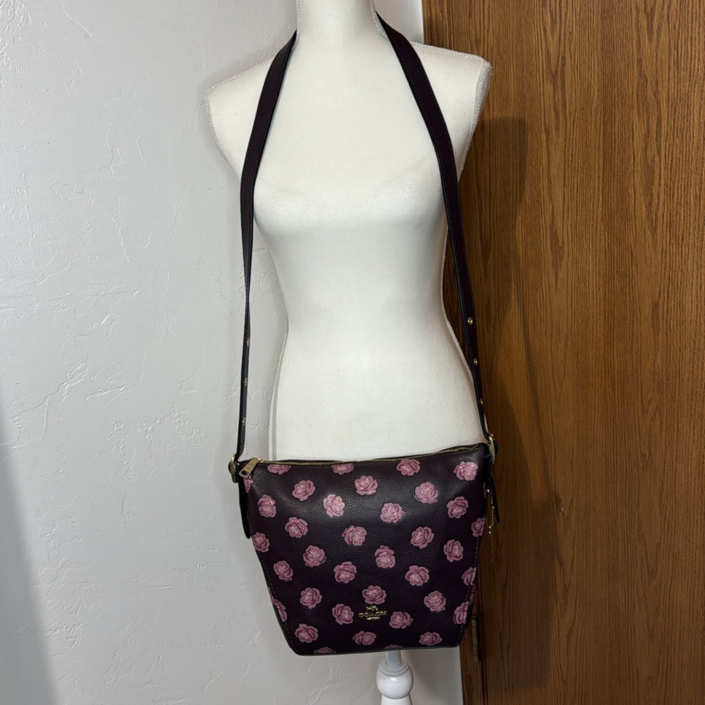 Coach ox blood leather rose print dufflette crossbody bag